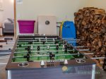 Foosball table in the garage, and there are also two cornhole boards.